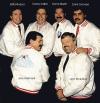 The American Music Company Band circa 1987. Left to right: Billy Windsor (vocal, guitar), Jerry Wallmark (drums) , Danny Gatton (guitar), Denny Martin (vocal), John Broaddus (sax), Ernie Gorospe (bass).